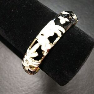 Jiu Long Xing gold tone black enamel with flowers bracelet 7.25"